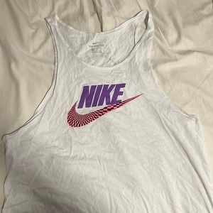 Nike large white tank. Had for several years. Haven’t worn it in the past year